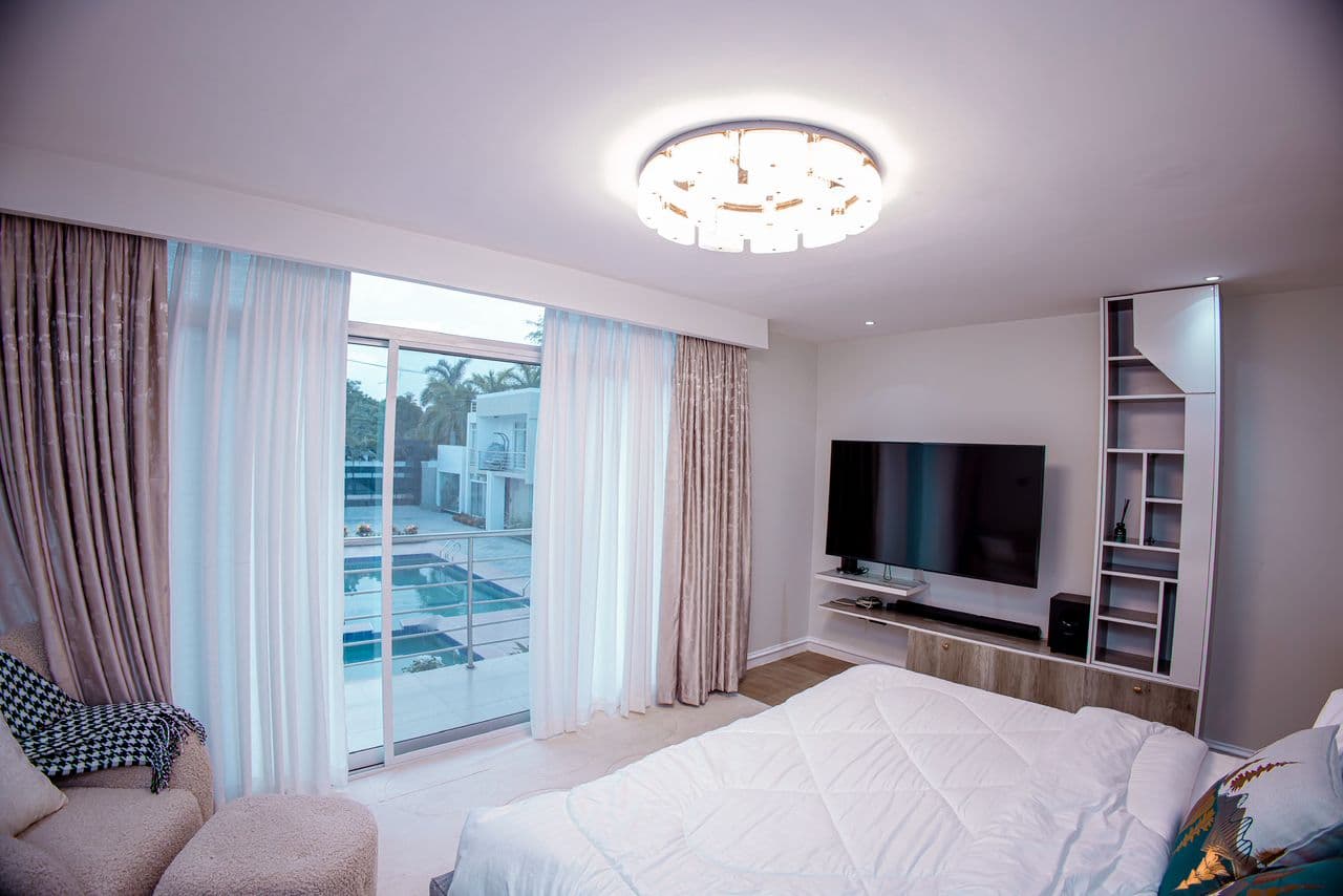 Master bedroom with poolside view